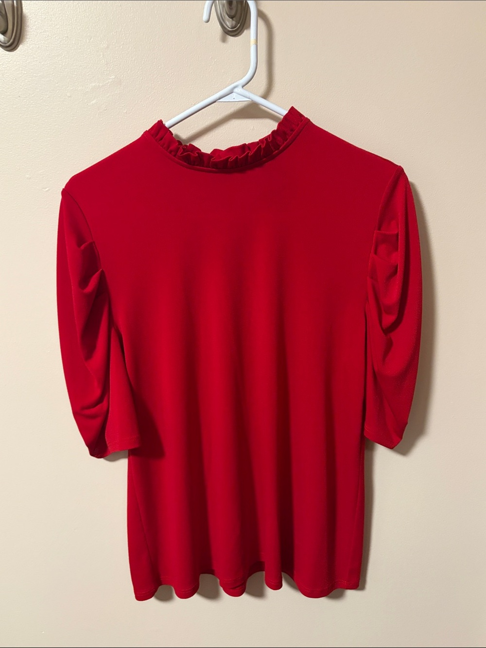 Cece’s red dress shirt